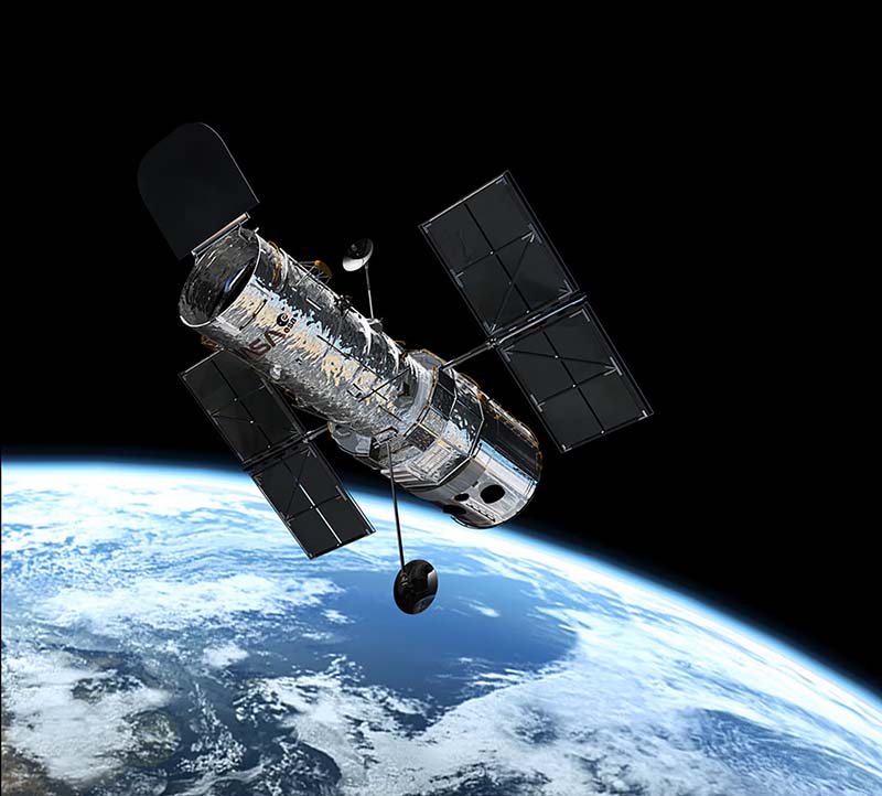 The Hubble space telescope in orbit 335 miles (540km) above the Earth. Image Credit: European Space Agency/PA